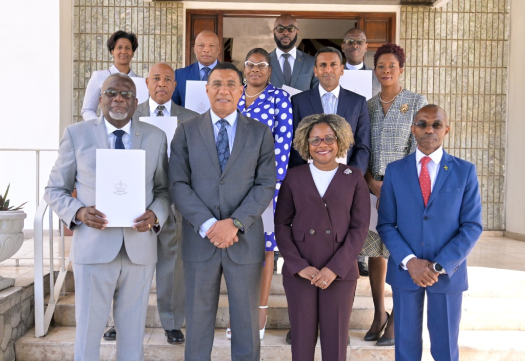 Prime Minister, the Most Hon. Andrew Holness (second left), shares a photo opportunity with the nine newly appointed members of the National Identification and Registration Authority following a meeting today (March 15) at Jamaica House. He is joined by Minister without portfolio in the Office of the Prime Minister with responsibility for Skills and Digital Transformation, Senator Dr. the Hon. Dana Morris Dixon (second right); and Permanent Secretary, Office of the Prime Minister, Dr. Rocky Meade.